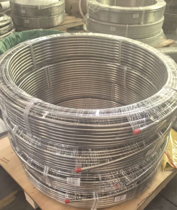 Bright annealed seamless stainless steel coiled tubing Bright annealed stainless steel seamless coiled tubing coils packed on wooden pallets